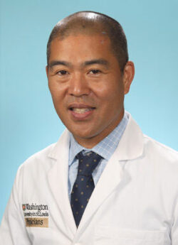 Headshot of Dr. Elvin Geng in a white coat