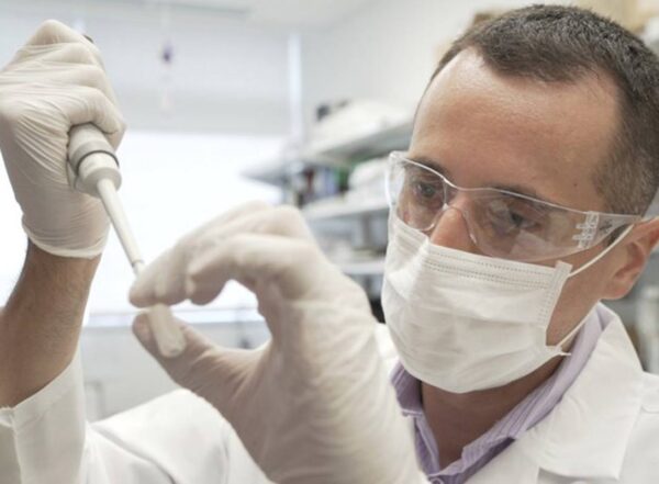 Researcher Nicolas Barthelemy works on a p-tau217 test for Alzheimer's disease at a laboratory.