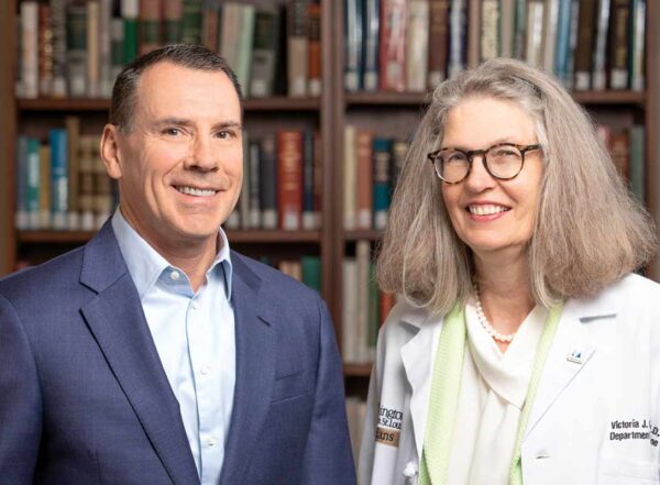 Lee Kling and Victoria Fraser, MD, smile for a photograph