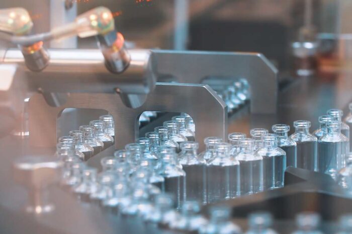 Glass vaccine vials in production line